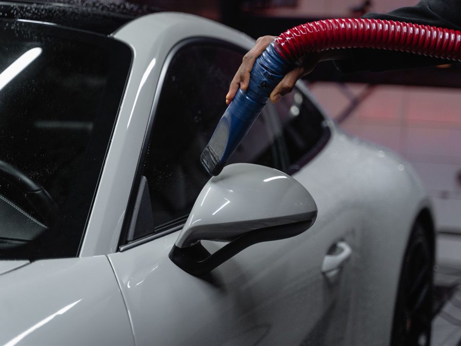 Freshly washed car being dried with filtered air